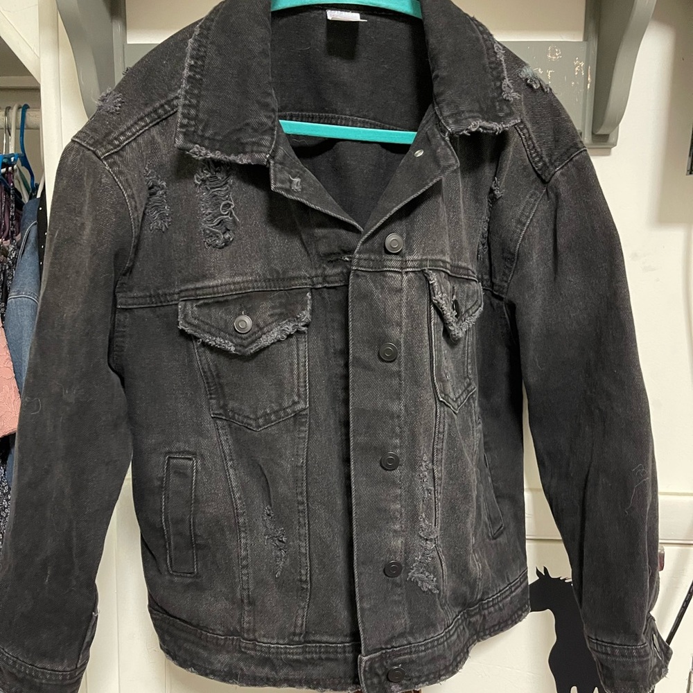 Ripped black jean jacket